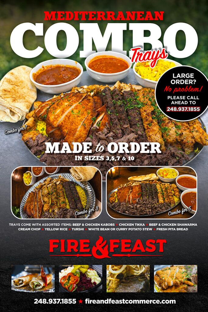 Mediterranean kabob tray with beef kabobs, chicken kabobs, chicken tikka, shawarma, yellow rice, and fresh pita bread from Fire & Feast in Commerce Township, Michigan.